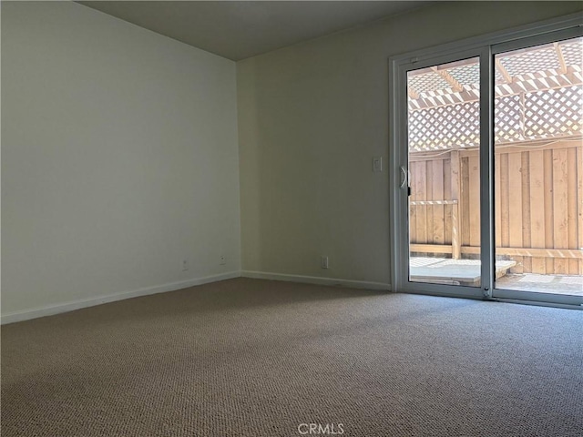 2707 Vanderbilt Ln Unit 1, Redondo Beach, CA 90278 - carpeted empty room featuring baseboards