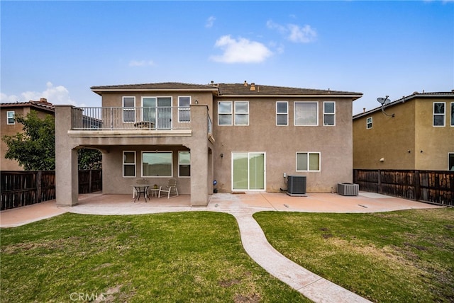 16219 Skyridge Dr, Riverside, CA 92503 - rear view of property with a balcony, stucco siding, a patio area, and central AC