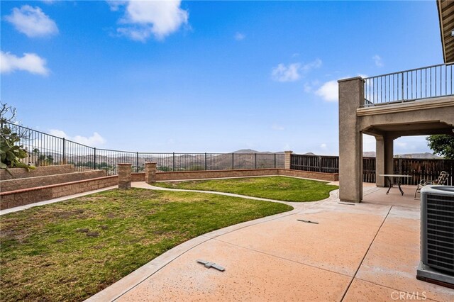 16219 Skyridge Dr, Riverside, CA 92503 - view of yard featuring a patio and cooling unit
