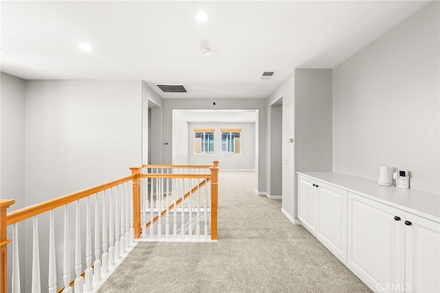 16219 Skyridge Dr, Riverside, CA 92503 - hall featuring an upstairs landing, light colored carpet, baseboards, and recessed lighting