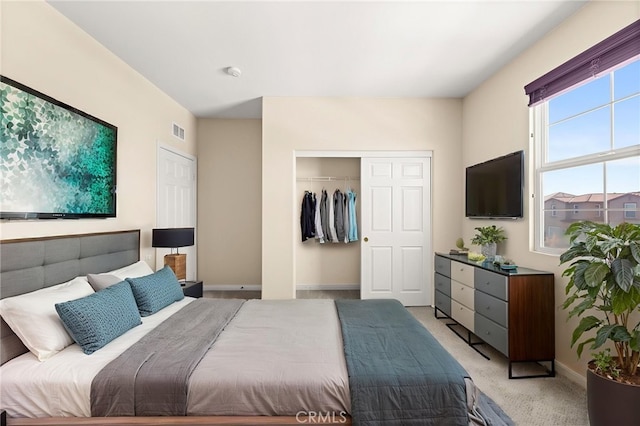 16219 Skyridge Dr, Riverside, CA 92503 - bedroom with light colored carpet, baseboards, and a closet