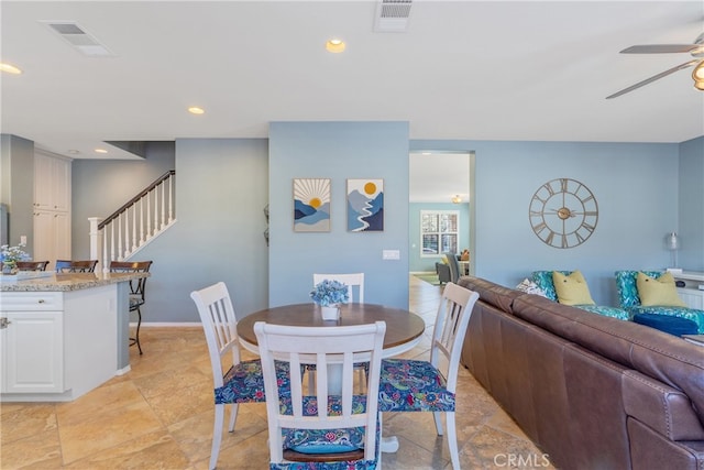 dining area with stairway, a ceiling fan, visible vents, and recessed lighting