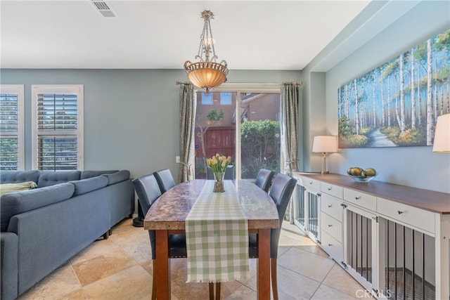 dining space with visible vents