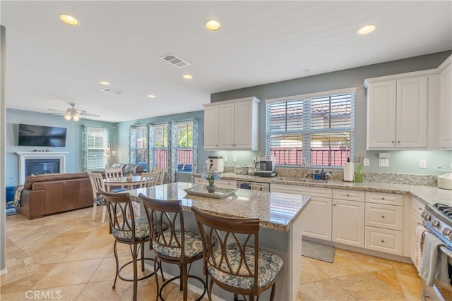 kitchen with visible vents, a sink, recessed lighting, and appliances with stainless steel finishes