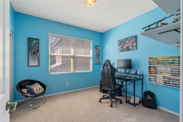 carpeted office with baseboards