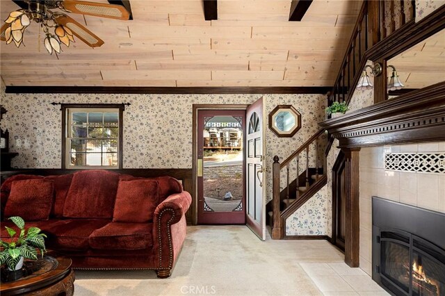 229 Maple Dr, Lake Arrowhead, CA 92352 - living area with wallpapered walls, ceiling fan, stairs, light colored carpet, and wood ceiling