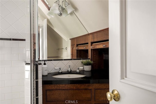 229 Maple Dr, Lake Arrowhead, CA 92352 - bathroom featuring backsplash, vanity, and a shower with door