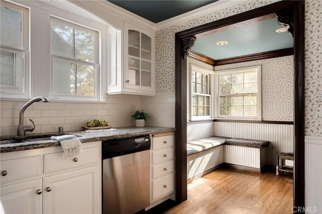 229 Maple Dr, Lake Arrowhead, CA 92352 - kitchen featuring dishwasher, a sink, light wood finished floors, ornamental molding, and light stone countertops