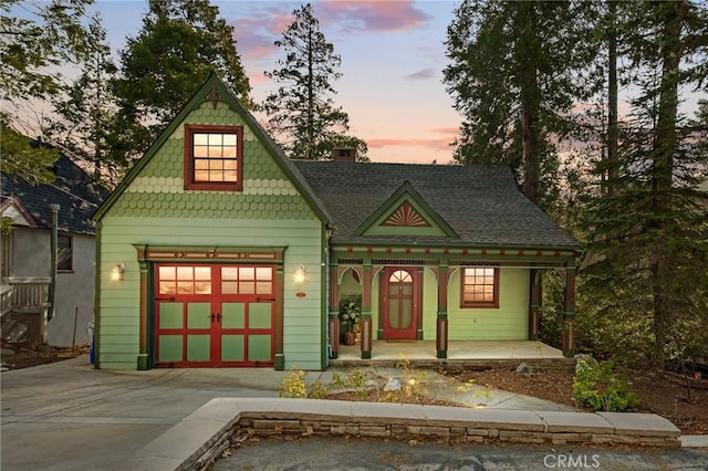 229 Maple Dr, Lake Arrowhead, CA 92352 - victorian house with covered porch, a chimney, and a shingled roof