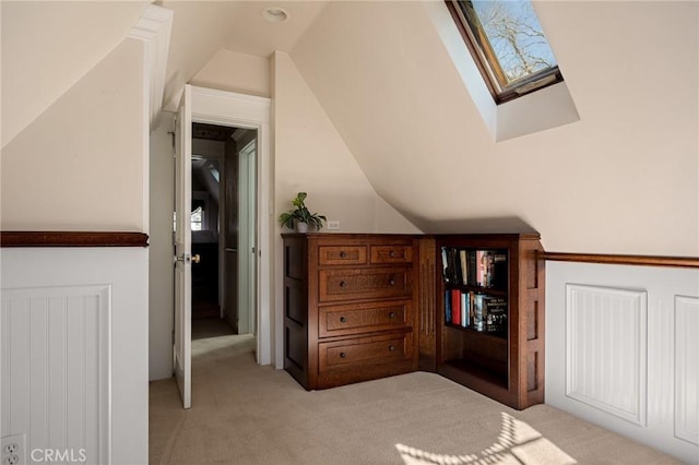 229 Maple Dr, Lake Arrowhead, CA 92352 - bedroom featuring light carpet, vaulted ceiling, and a skylight