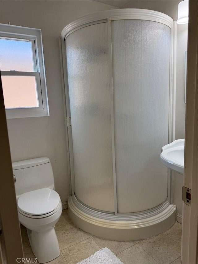 344 Ultimo Ave, Long Beach, CA 90814 - bathroom with toilet, a shower stall, and tile patterned flooring