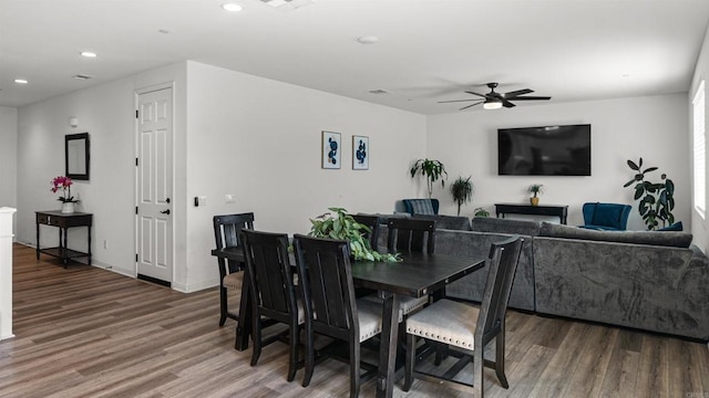 dining area with wood finished floors, ceiling fan, recessed lighting, and baseboards