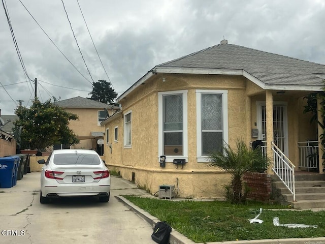321 Walnut St, Santa Paula, CA 93060 - view of property exterior with roof with shingles and stucco siding