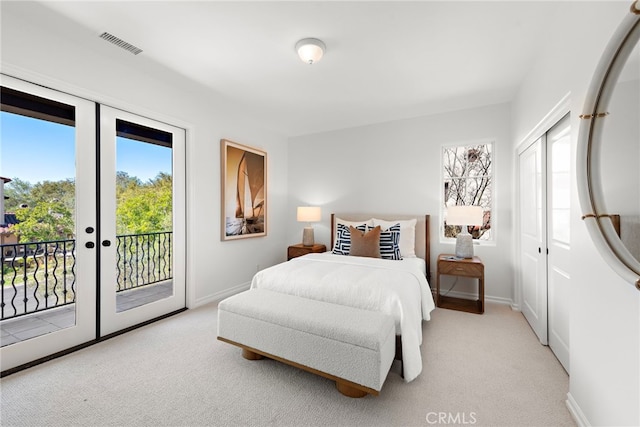 bedroom featuring visible vents, carpet flooring, access to outside, and baseboards