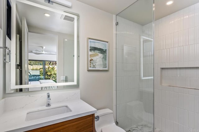 5170 Carlsbad Blvd, Carlsbad, CA 92008 - ensuite bathroom featuring vanity, a tile shower, toilet, and recessed lighting
