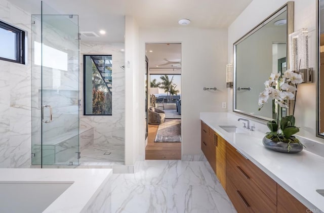5170 Carlsbad Blvd, Carlsbad, CA 92008 - full bath featuring double vanity, marble tiled flooring, a marble finish shower, and ensuite bath