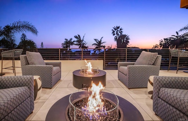 5170 Carlsbad Blvd, Carlsbad, CA 92008 - patio terrace at dusk with a fire pit