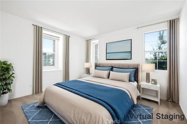bedroom with multiple windows
