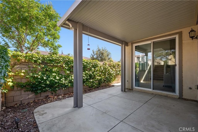 view of patio with a fenced backyard