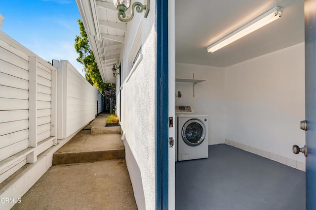 laundry area featuring washer / clothes dryer and laundry area