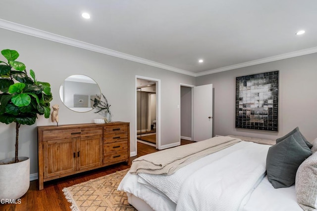 bedroom featuring crown molding, baseboards, dark wood finished floors, and recessed lighting