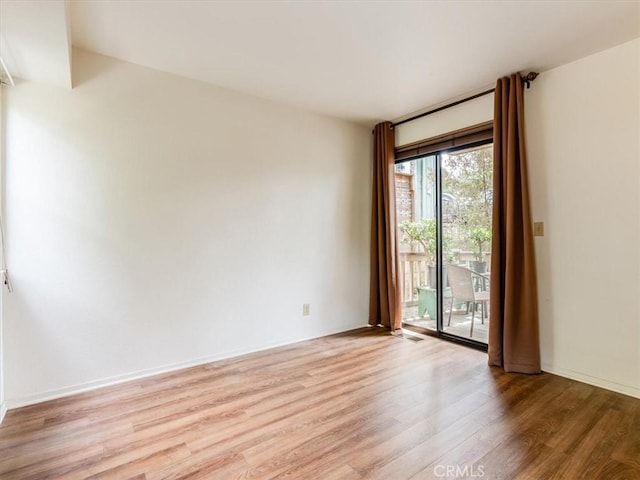 2320 Wilcombe Dr, Cambria, CA 93428 - empty room with light wood-style floors and baseboards