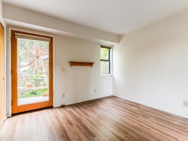 2320 Wilcombe Dr, Cambria, CA 93428 - unfurnished room with wood finished floors and baseboards