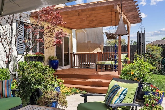 wooden deck with a pergola and fence