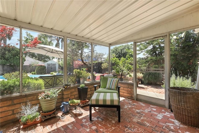 sunroom / solarium featuring plenty of natural light