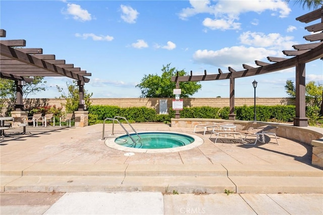 view of swimming pool with a pergola, a patio area, fence, and a community hot tub