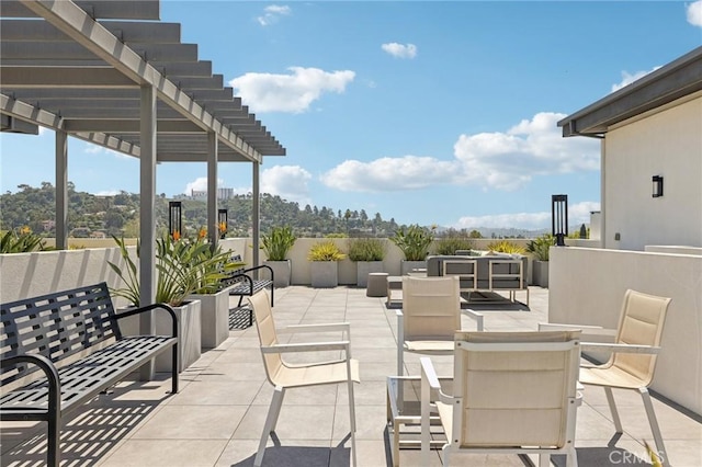 view of patio / terrace featuring a pergola