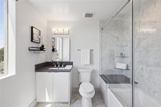 full bath featuring vanity, toilet, marble finish floor, visible vents, and combined bath / shower with glass door
