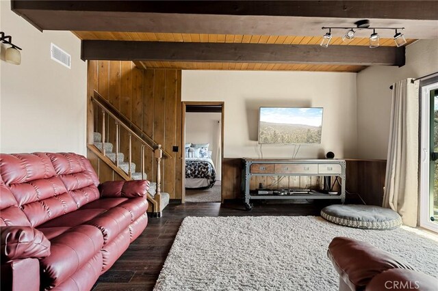 27994 W Shore Rd, Lake Arrowhead, CA 92352 - living room with wood finished floors, stairs, wooden ceiling with exposed beams, and wooden walls