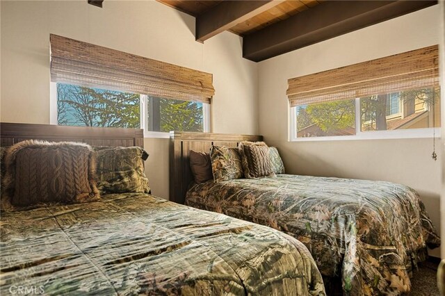 27994 W Shore Rd, Lake Arrowhead, CA 92352 - bedroom with multiple windows and wood ceiling with exposed beams