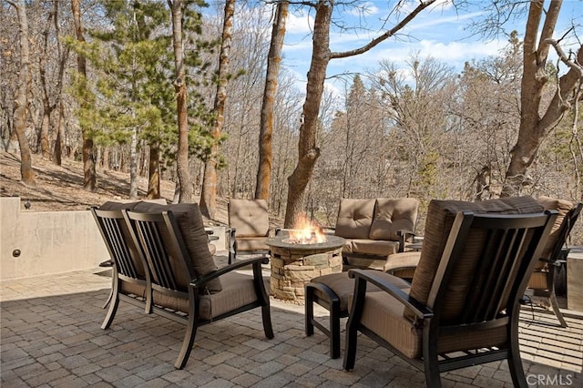27994 W Shore Rd, Lake Arrowhead, CA 92352 - view of patio / terrace featuring an outdoor living space with a fire pit