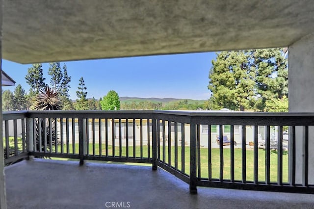 balcony featuring a mountain view