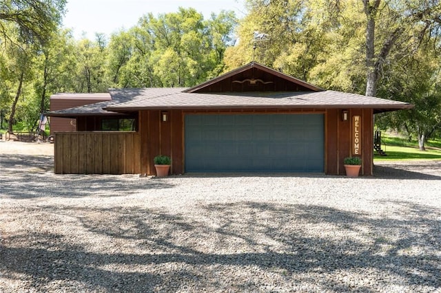 exterior space featuring gravel driveway