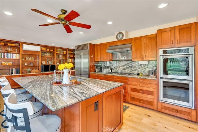 kitchen with a ceiling fan, range hood, open shelves, stainless steel appliances, and recessed lighting