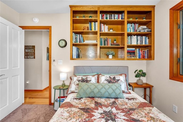 bedroom featuring carpet