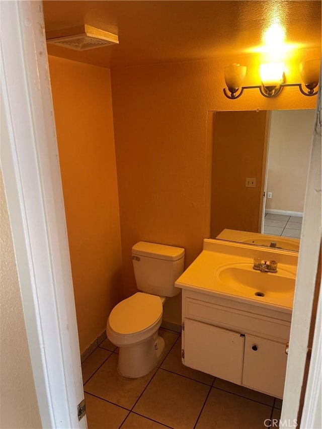 26873 Mossway St, Highland, CA 92346 - bathroom featuring tile patterned floors, vanity, and toilet