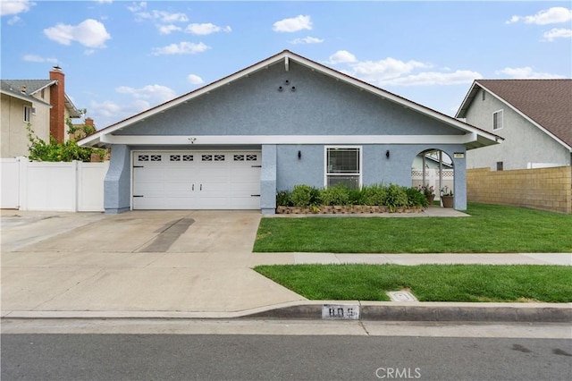 805 W Brentwood Ave, Orange, CA 92865 - view of front of property with stucco siding, driveway, and a garage