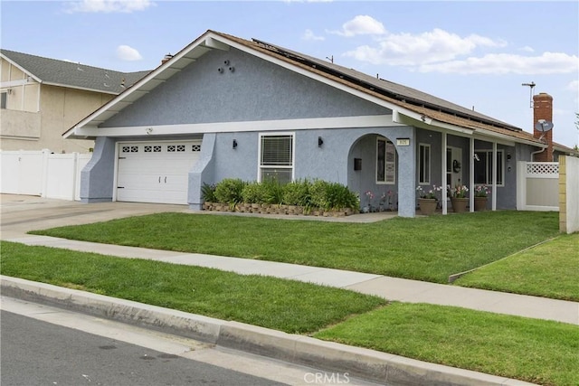 805 W Brentwood Ave, Orange, CA 92865 - ranch-style house featuring stucco siding, solar panels, and an attached garage