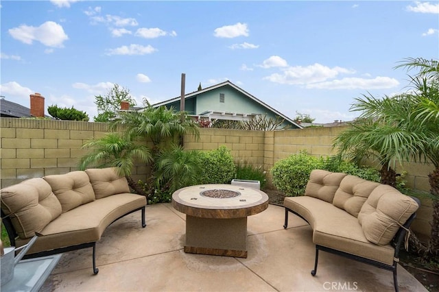 805 W Brentwood Ave, Orange, CA 92865 - fenced backyard featuring an outdoor living space with a fire pit and a patio