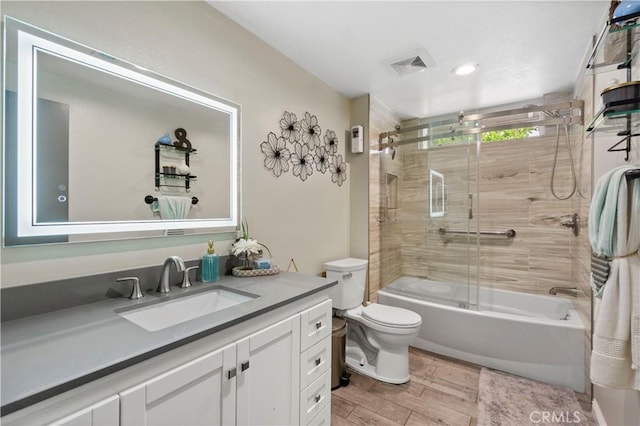 805 W Brentwood Ave, Orange, CA 92865 - full bathroom with vanity, enclosed tub / shower combo, and wood finished floors
