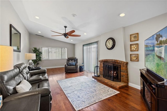 805 W Brentwood Ave, Orange, CA 92865 - living area featuring a ceiling fan, a fireplace, dark wood-style floors, lofted ceiling, and recessed lighting