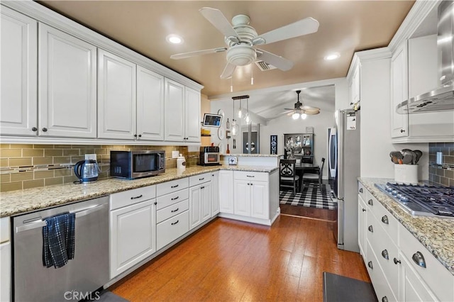 805 W Brentwood Ave, Orange, CA 92865 - kitchen featuring appliances with stainless steel finishes, wall chimney range hood, a ceiling fan, a peninsula, and light wood-style floors