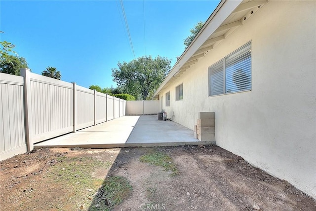 6087 Academy Ave, Riverside, CA 92506 - view of yard featuring a patio, a fenced backyard, and cooling unit