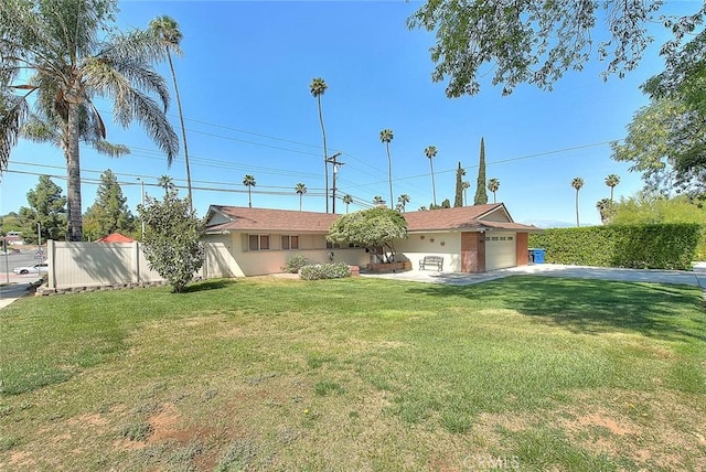 6087 Academy Ave, Riverside, CA 92506 - single story home with a front yard, an attached garage, fence, and concrete driveway