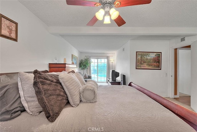 6087 Academy Ave, Riverside, CA 92506 - bedroom with a textured ceiling, beamed ceiling, and visible vents