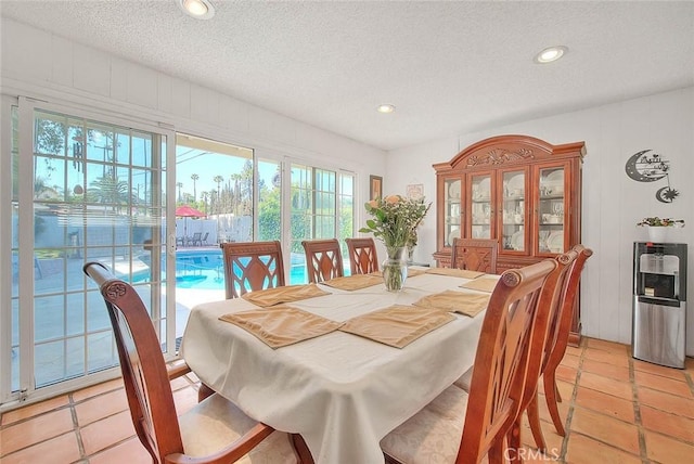 6087 Academy Ave, Riverside, CA 92506 - dining area featuring recessed lighting, plenty of natural light, and a textured ceiling